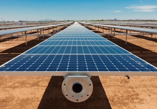 A picture of solar panels in a field.