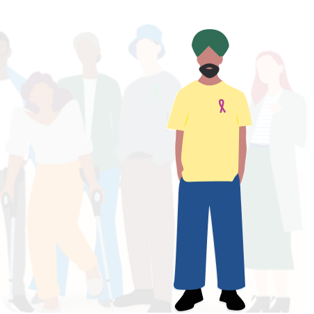 A man with a yellow shirt with a cancer ribbon on it standing with a grayed out background